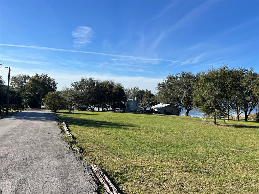 a view of a golf course with a lake