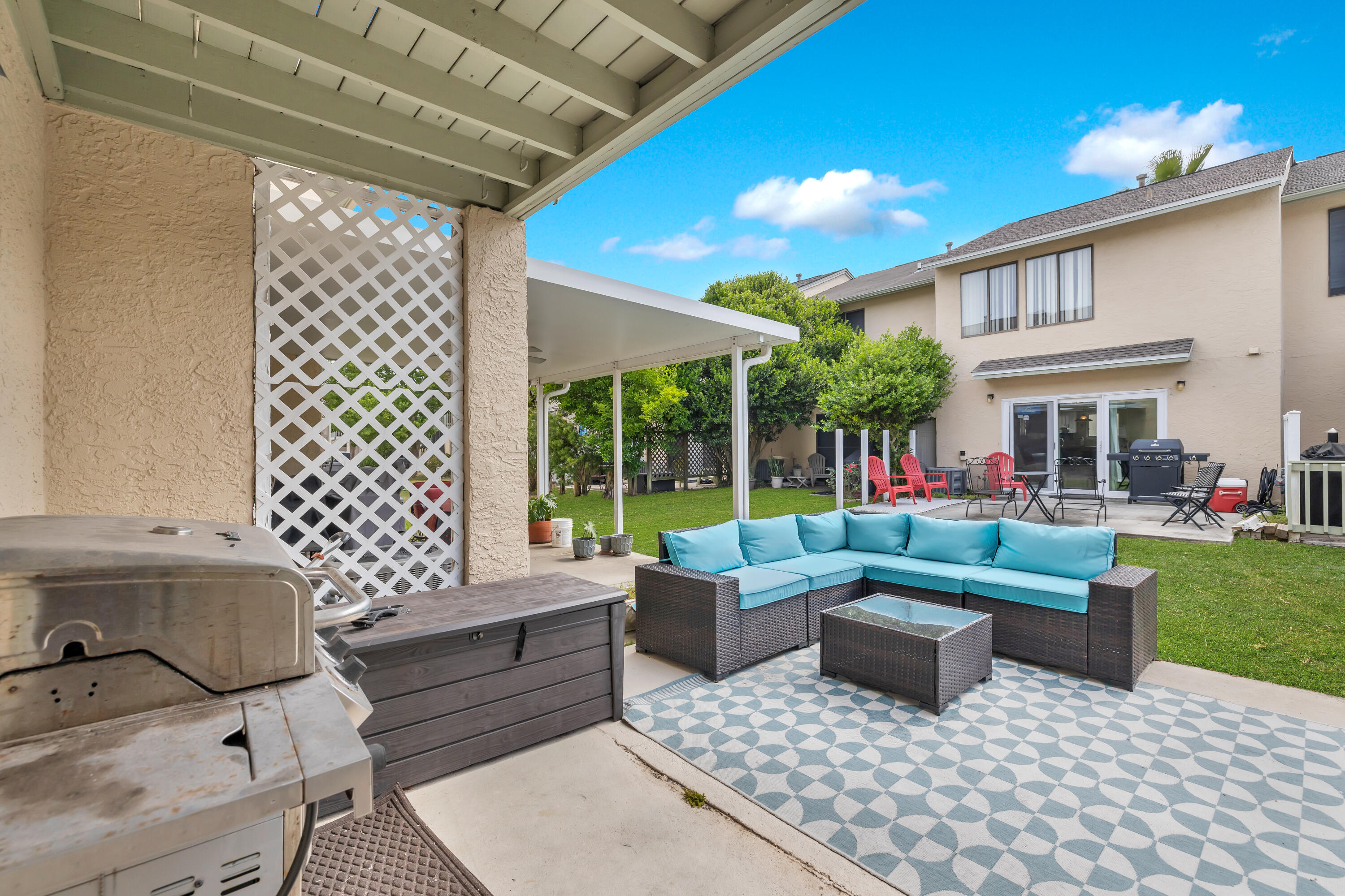 a living room with furniture and a yard