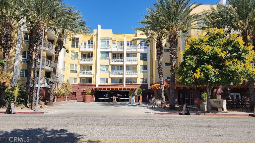 a front view of a building with street view