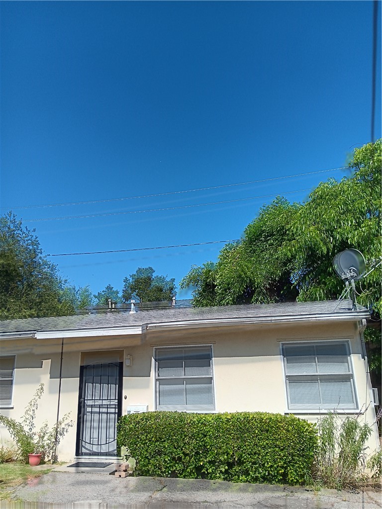 a view of a yard with an outdoor space