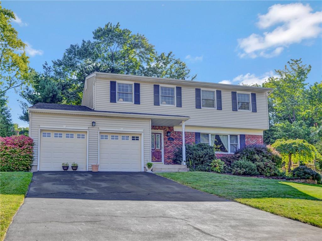 View of front of house featuring a 2 car garage