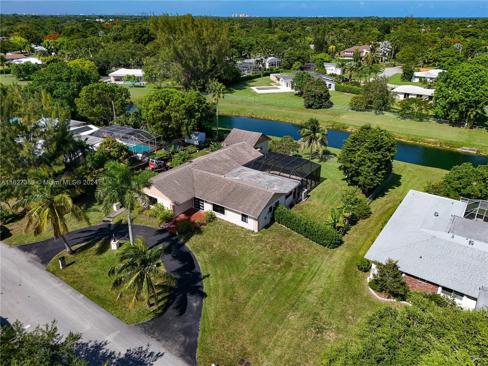 an aerial view of a house with a garden