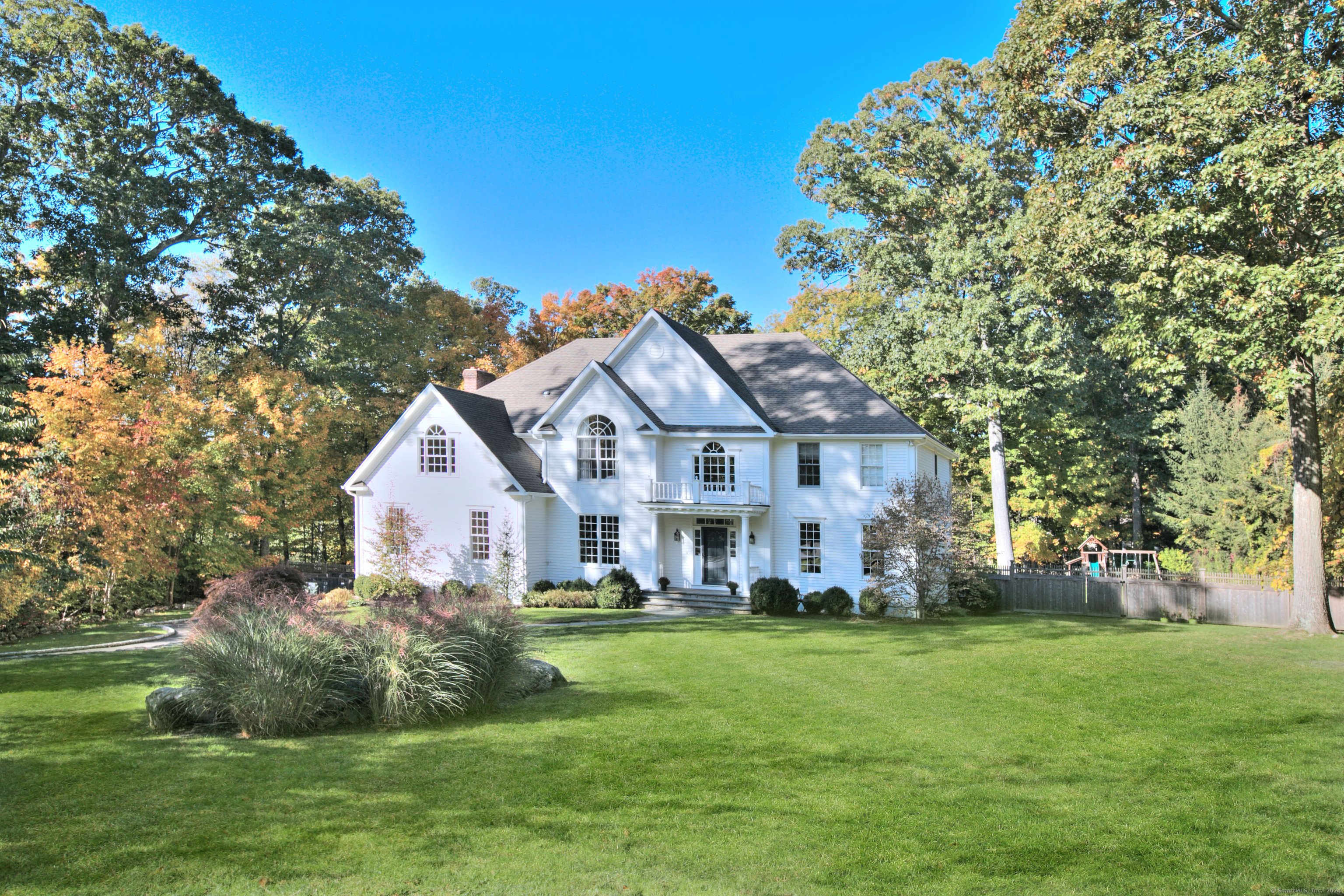 a view of a house with a big yard