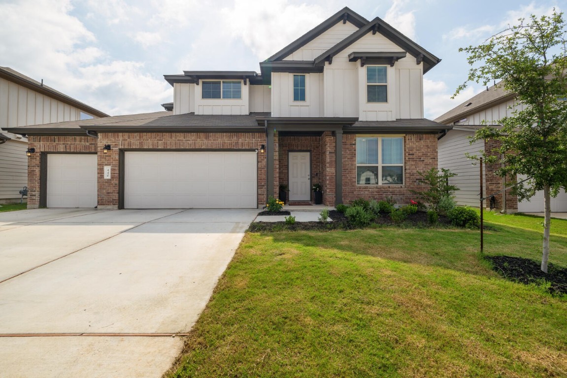 a front view of house with yard