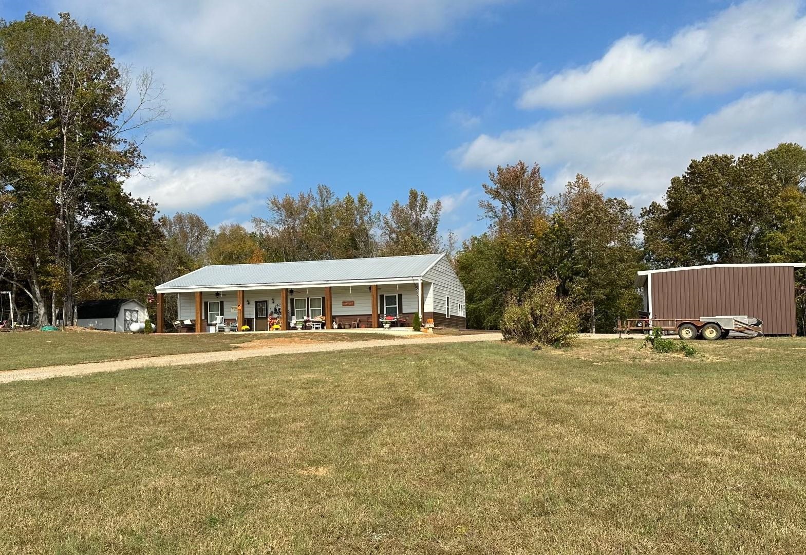 front view of a house with a yard