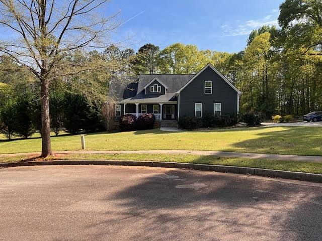 a view of a house with a swimming pool