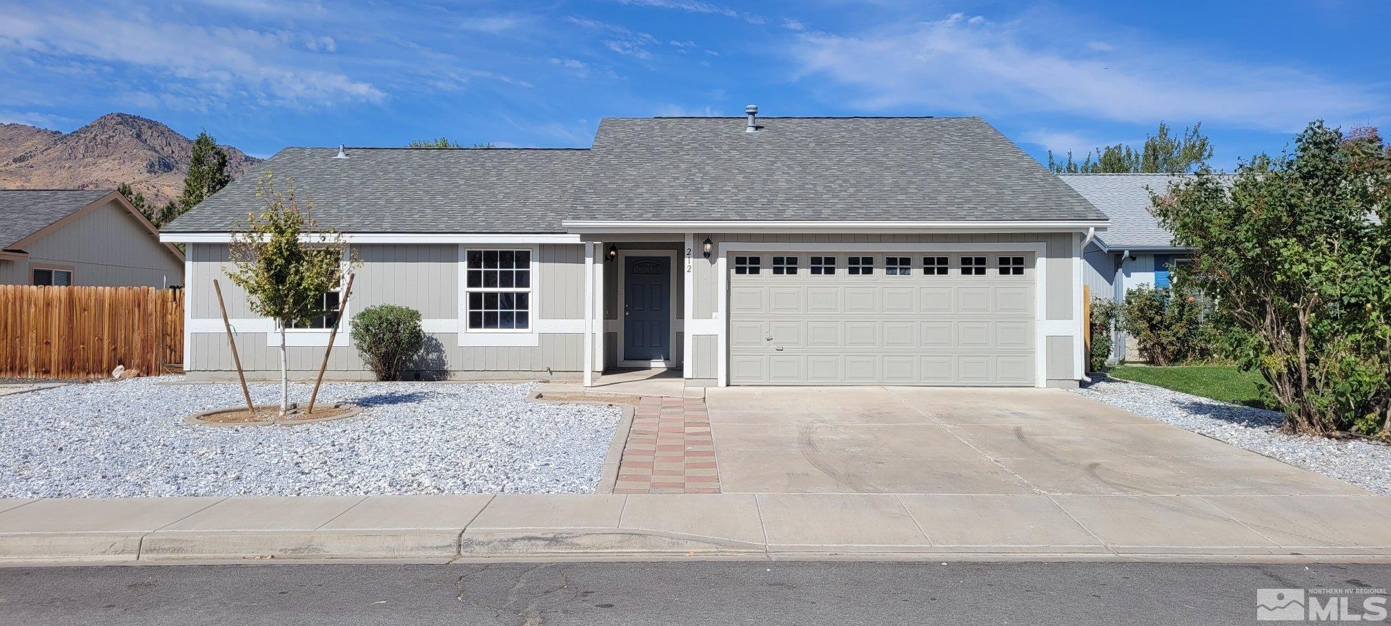 front view of house with a yard