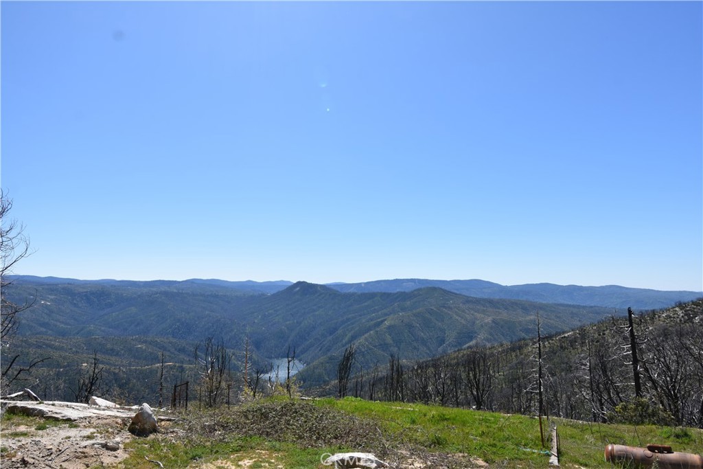 a view of a backyard with mountain view