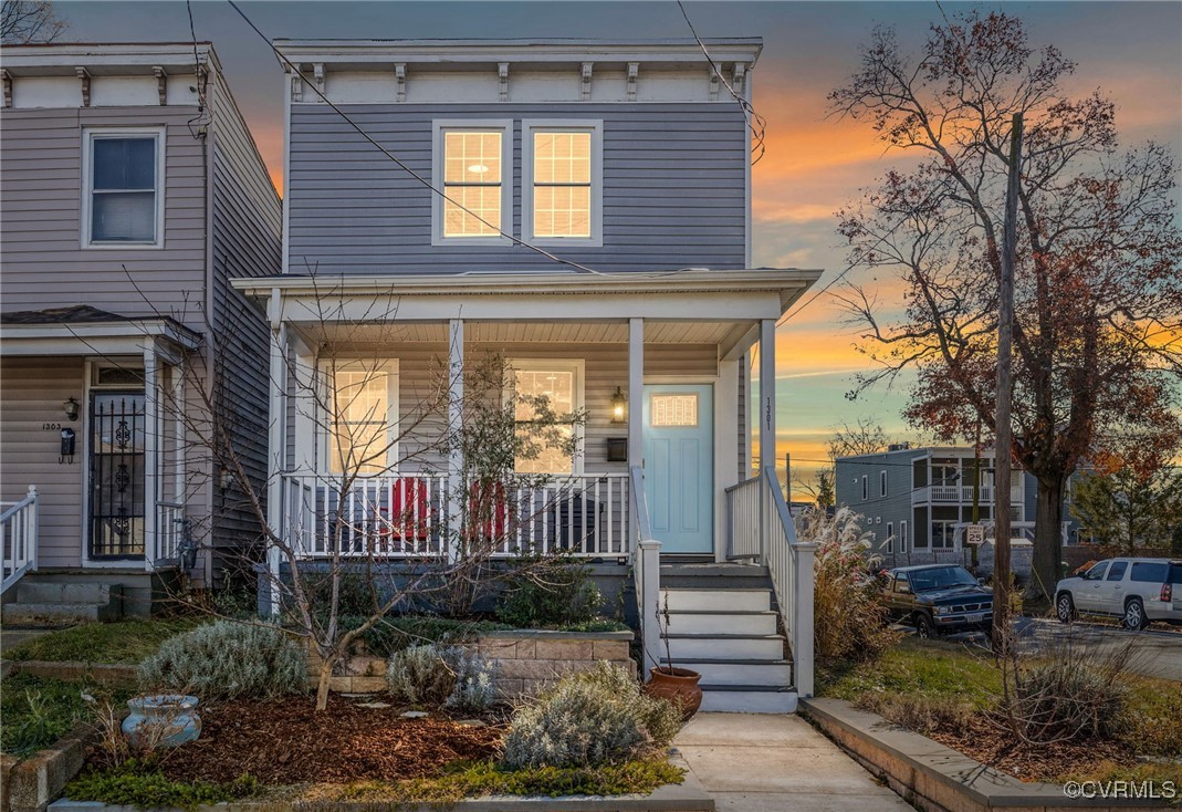 Italianate home with a porch