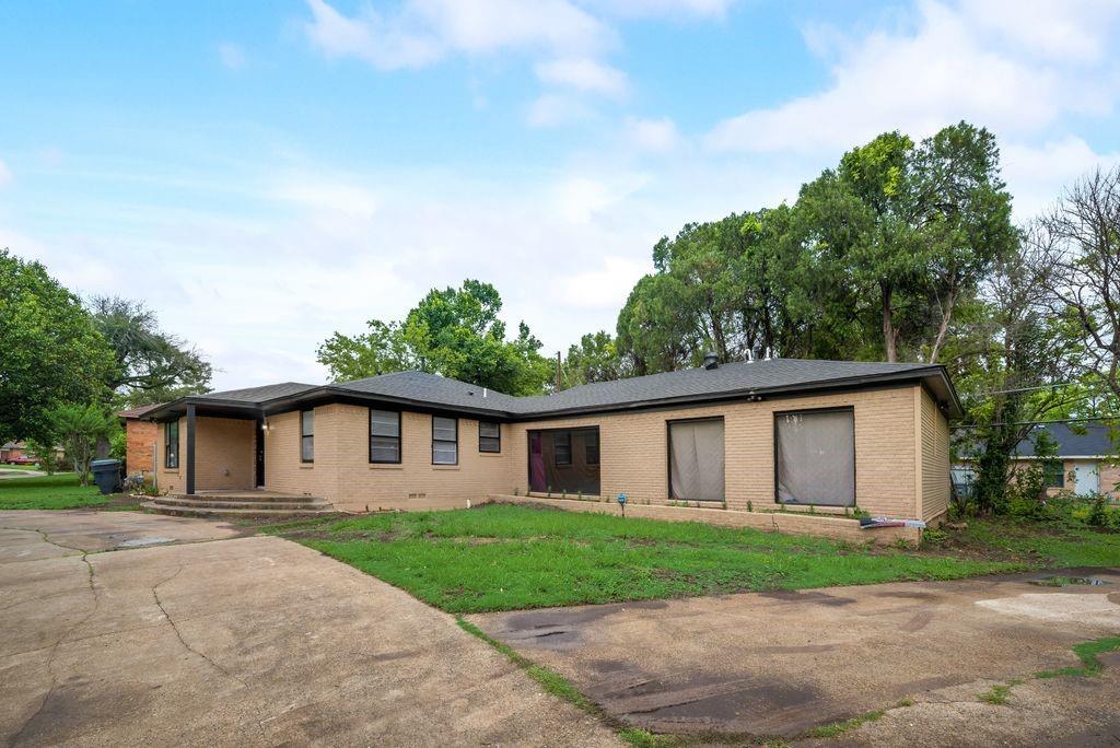 front view of a house and a yard