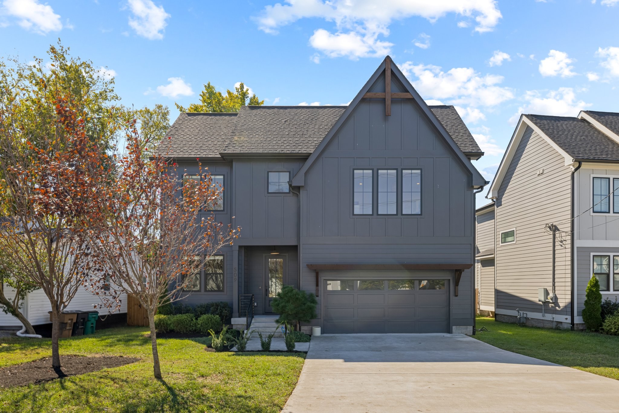 a front view of a house with garden