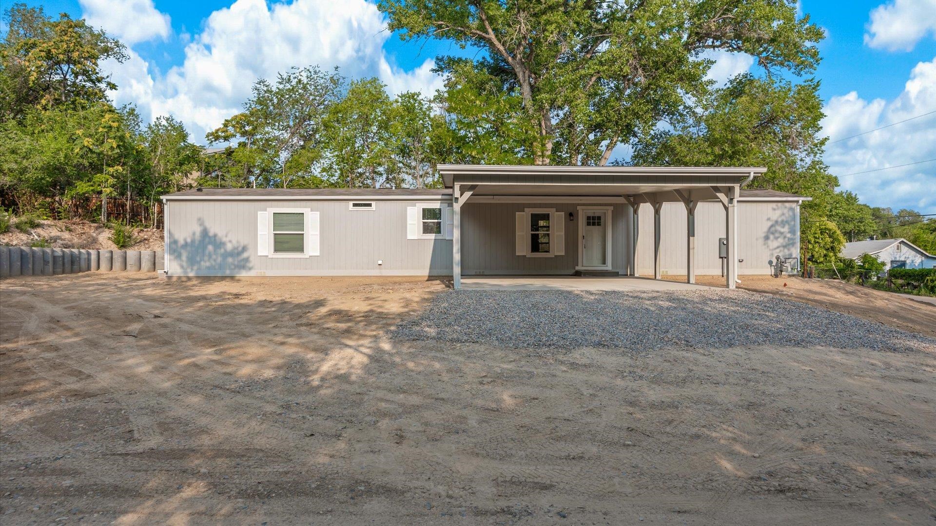 front view of house with a yard