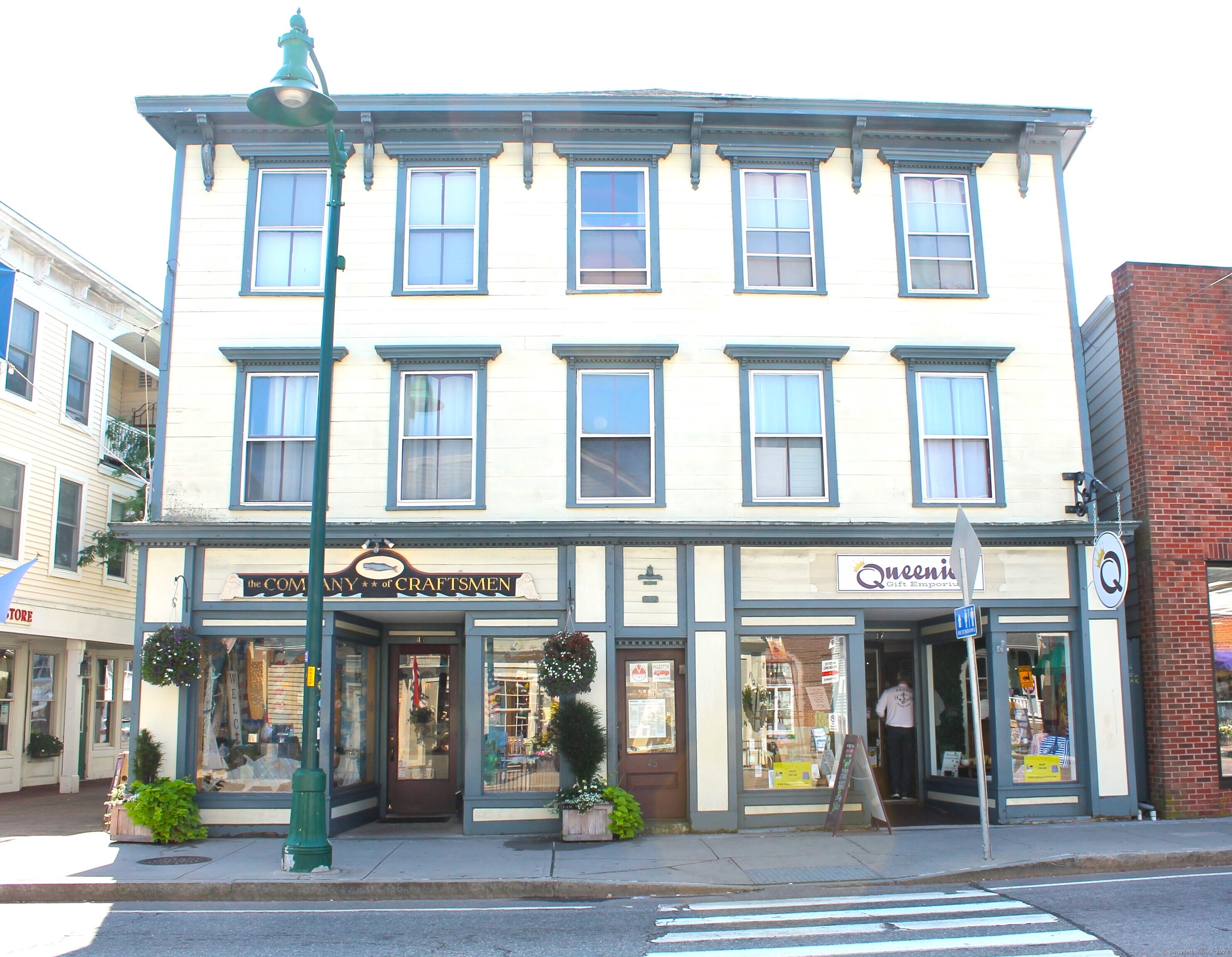 a view of a building on a street