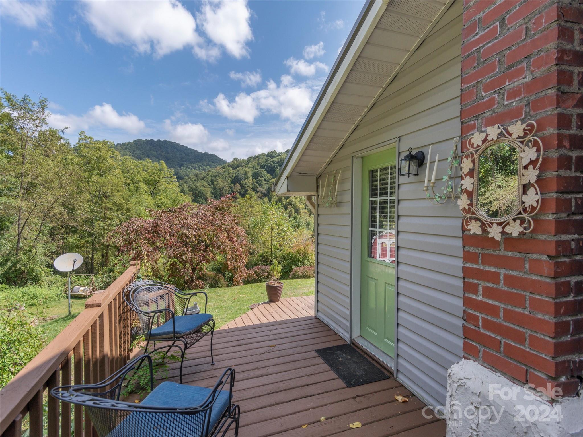 a house view with a seating space and garden view