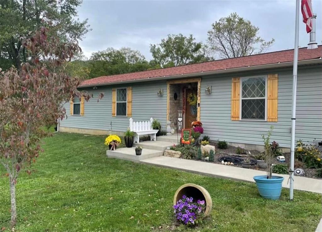 a front view of a house with patio