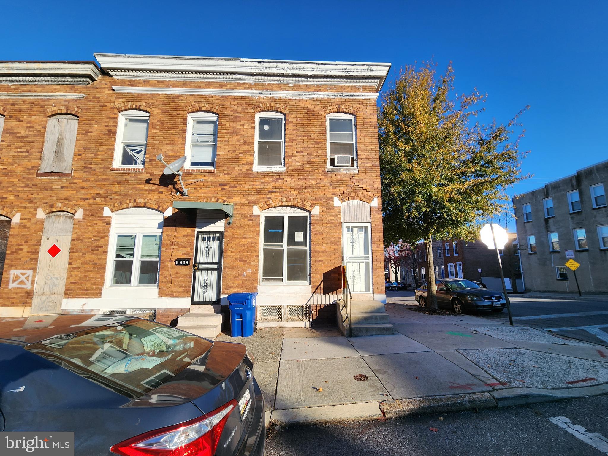 a car parked in front of a building