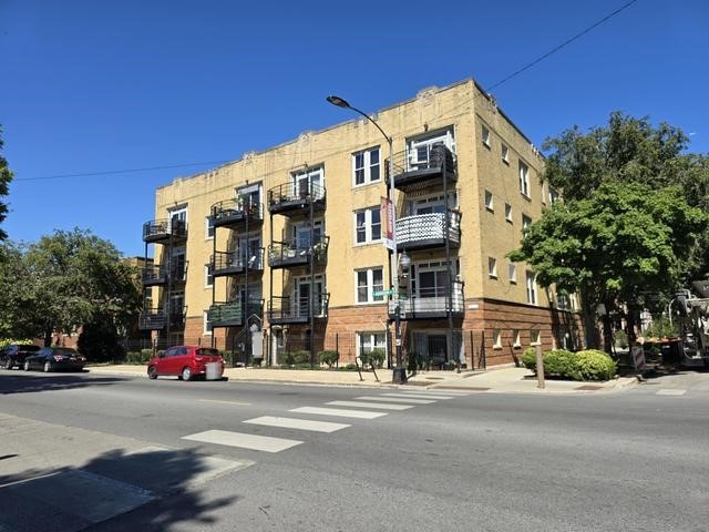 front view of a building with a street