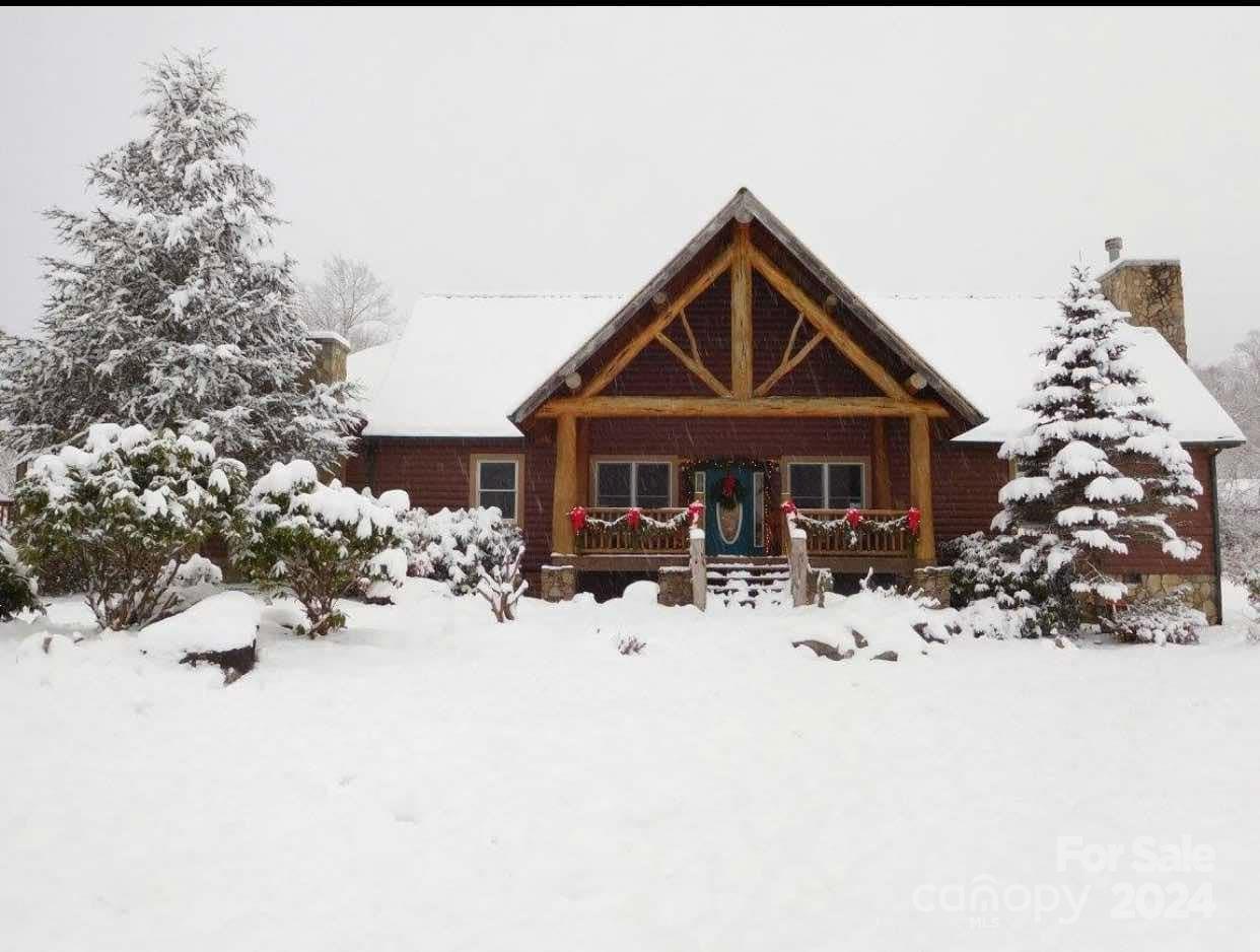 a front view of a house with yard