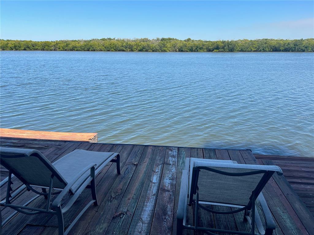 a view of a terrace with a lake view