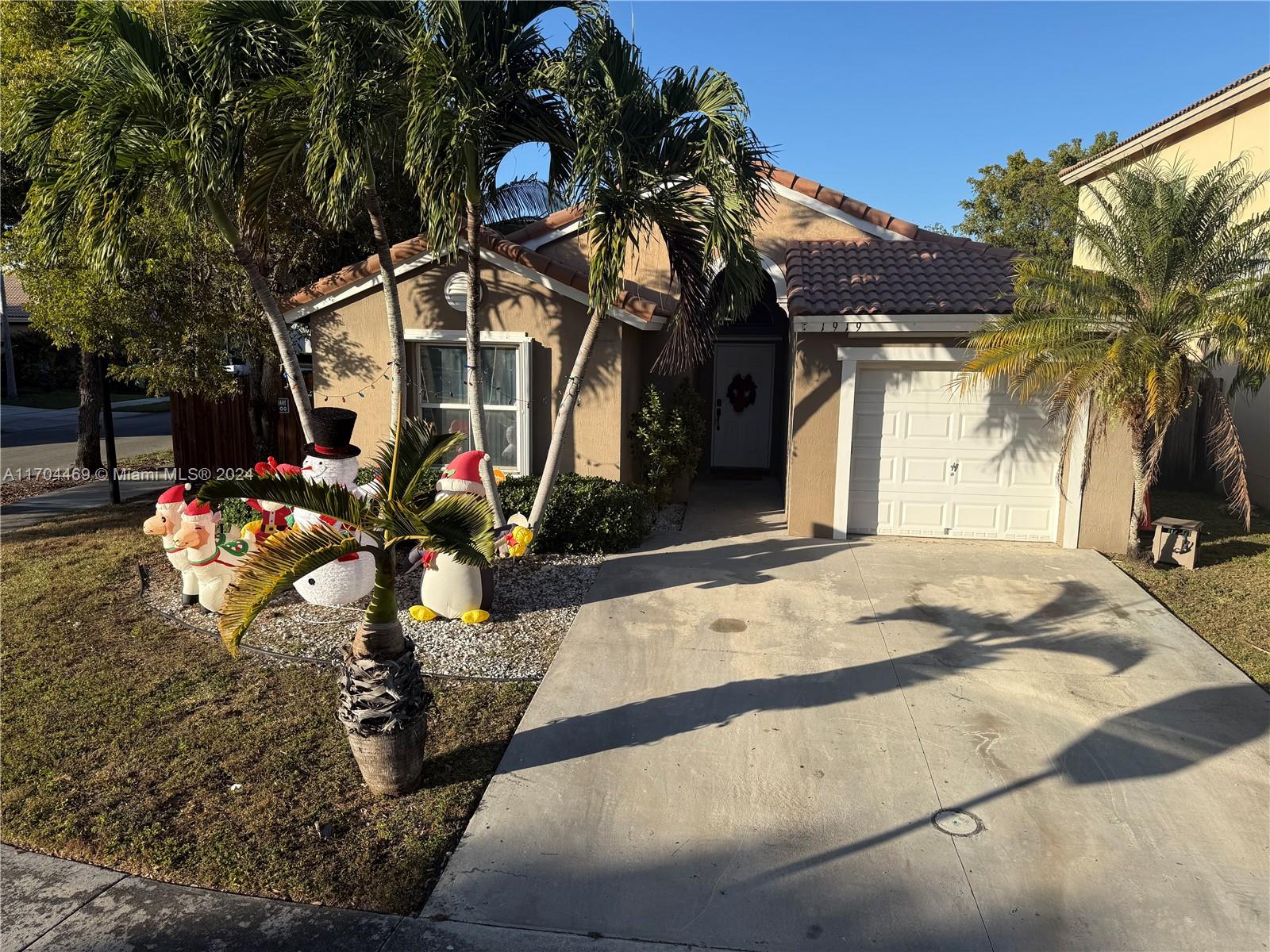 a view of a house with a snow on the yard