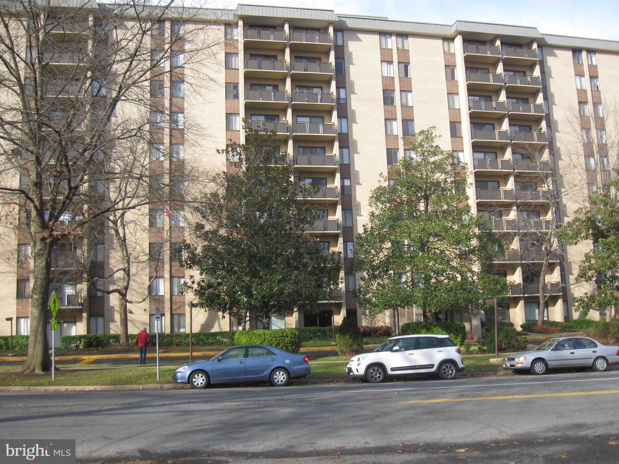 a cars parked in front of a building