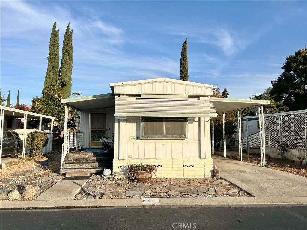 a front view of a house with a garage