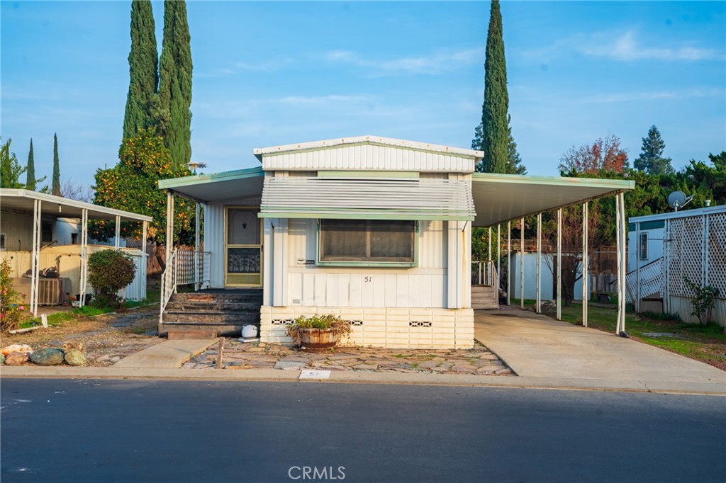 a view of a house with a patio