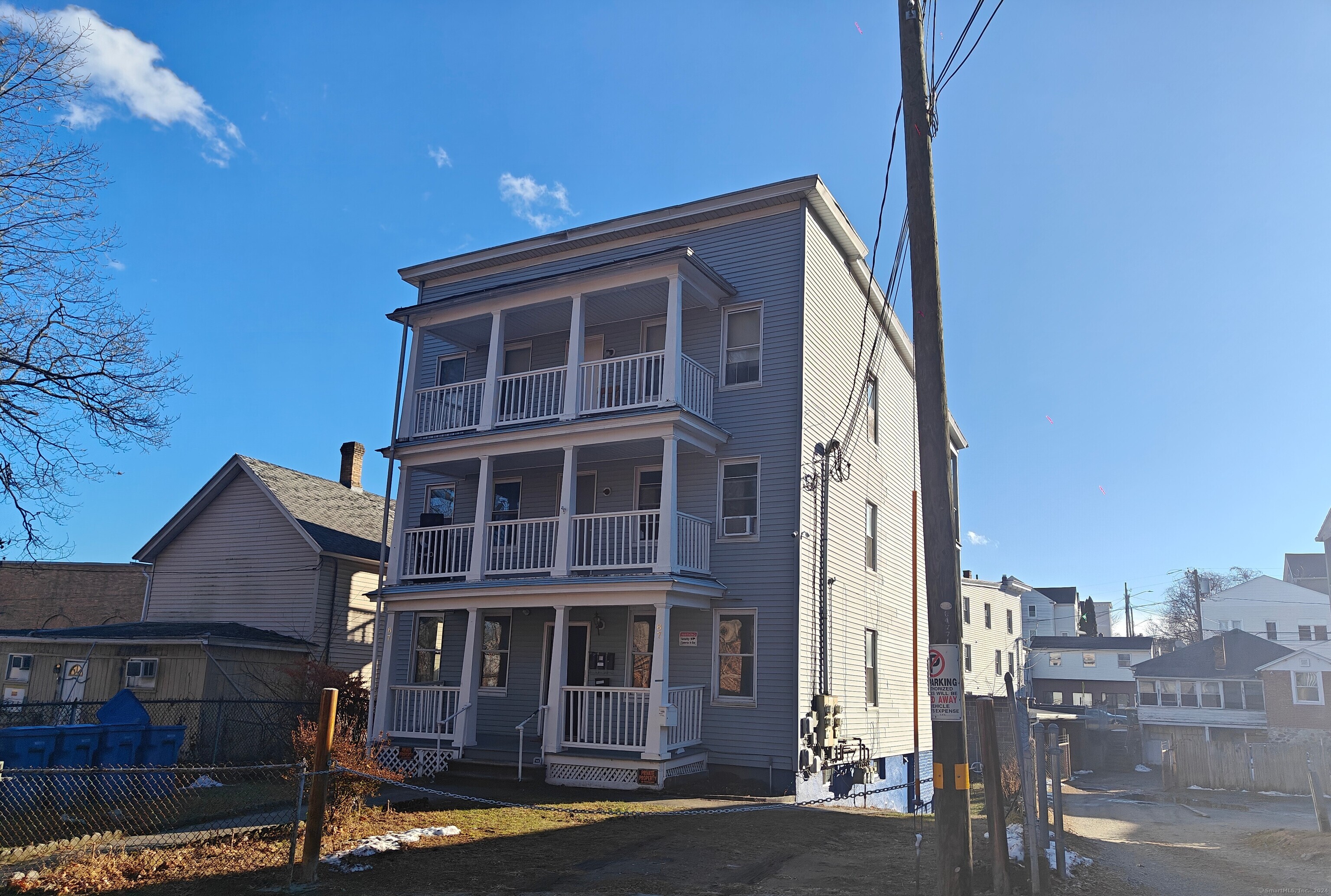 a front view of a building with street view