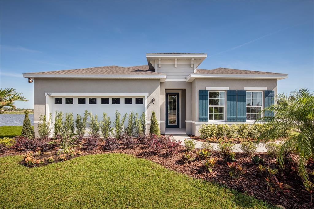 a front view of house with yard outdoor seating and barbeque oven