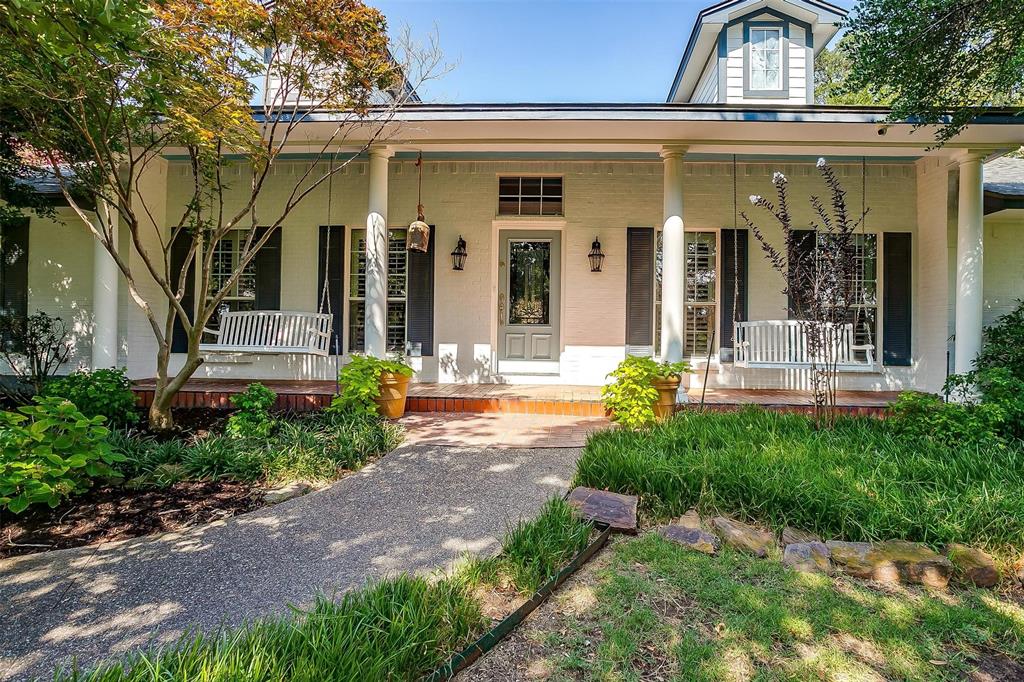 Graceful entrances with plentiful shade and matching porch swings