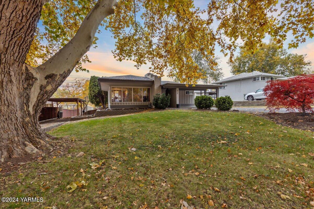 front view of house with a yard