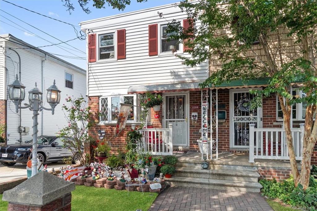 View of front of house featuring covered porch