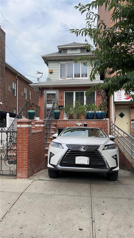 a car parked in front of a building