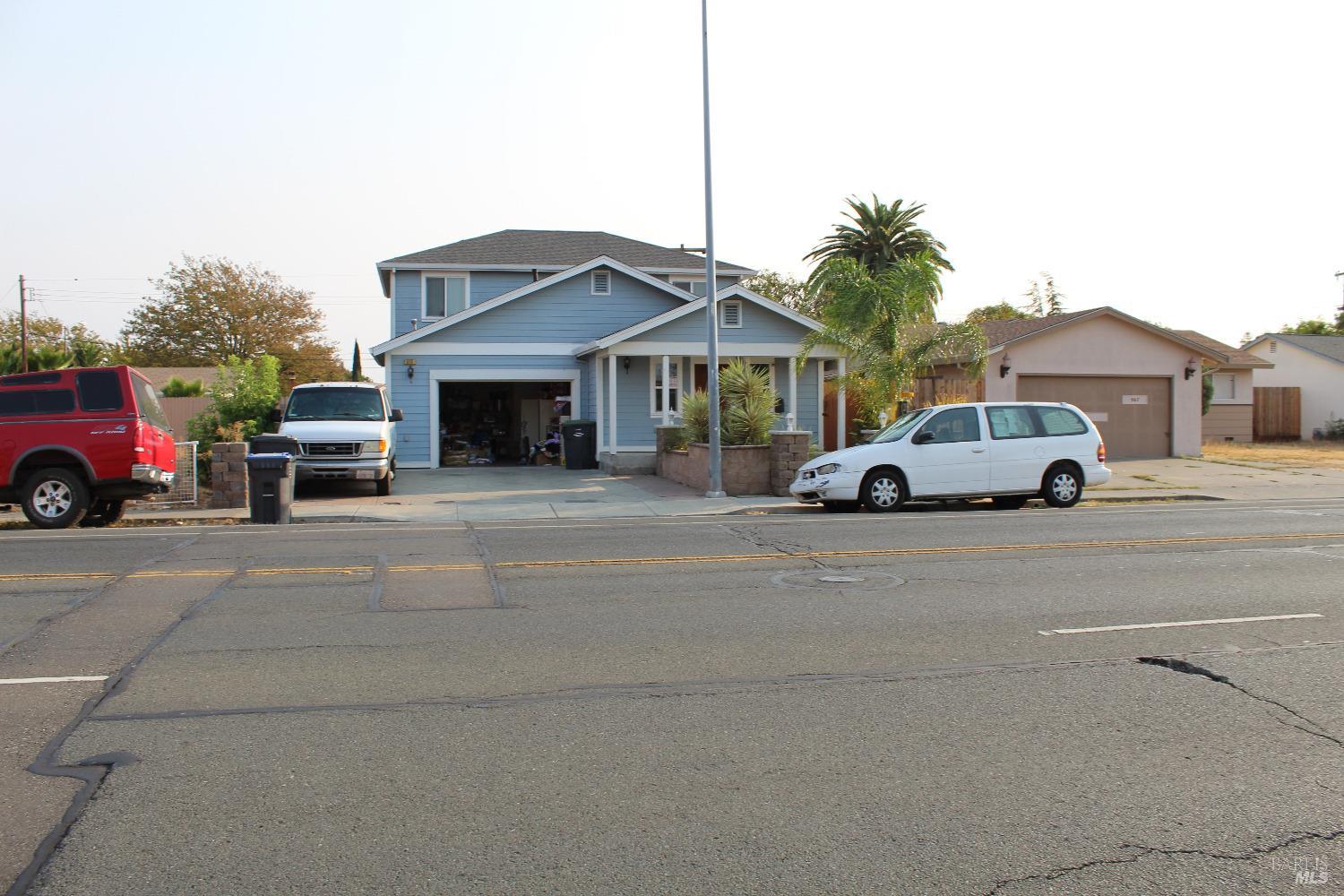 a car parked in front of a house