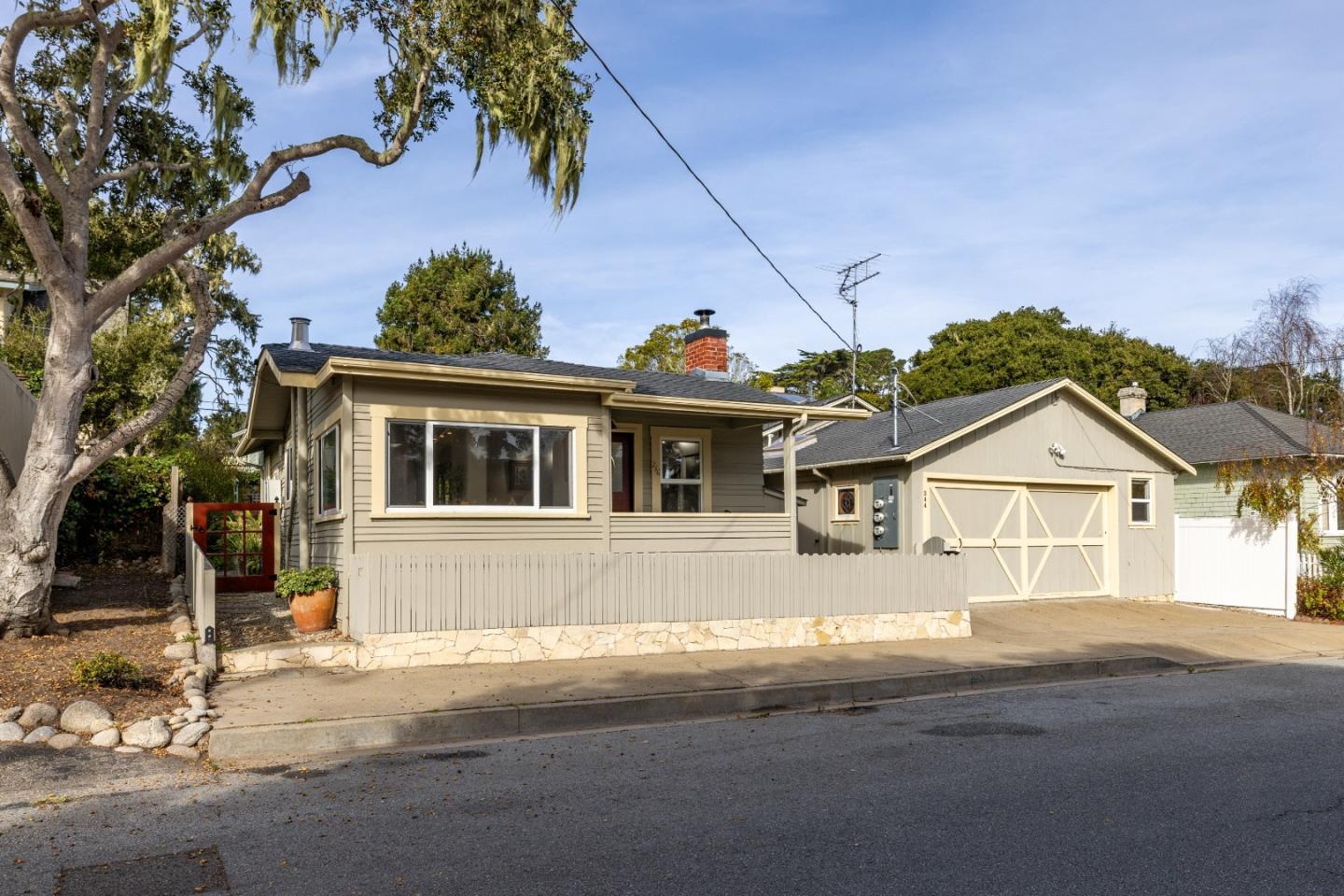 front view of a house with a street