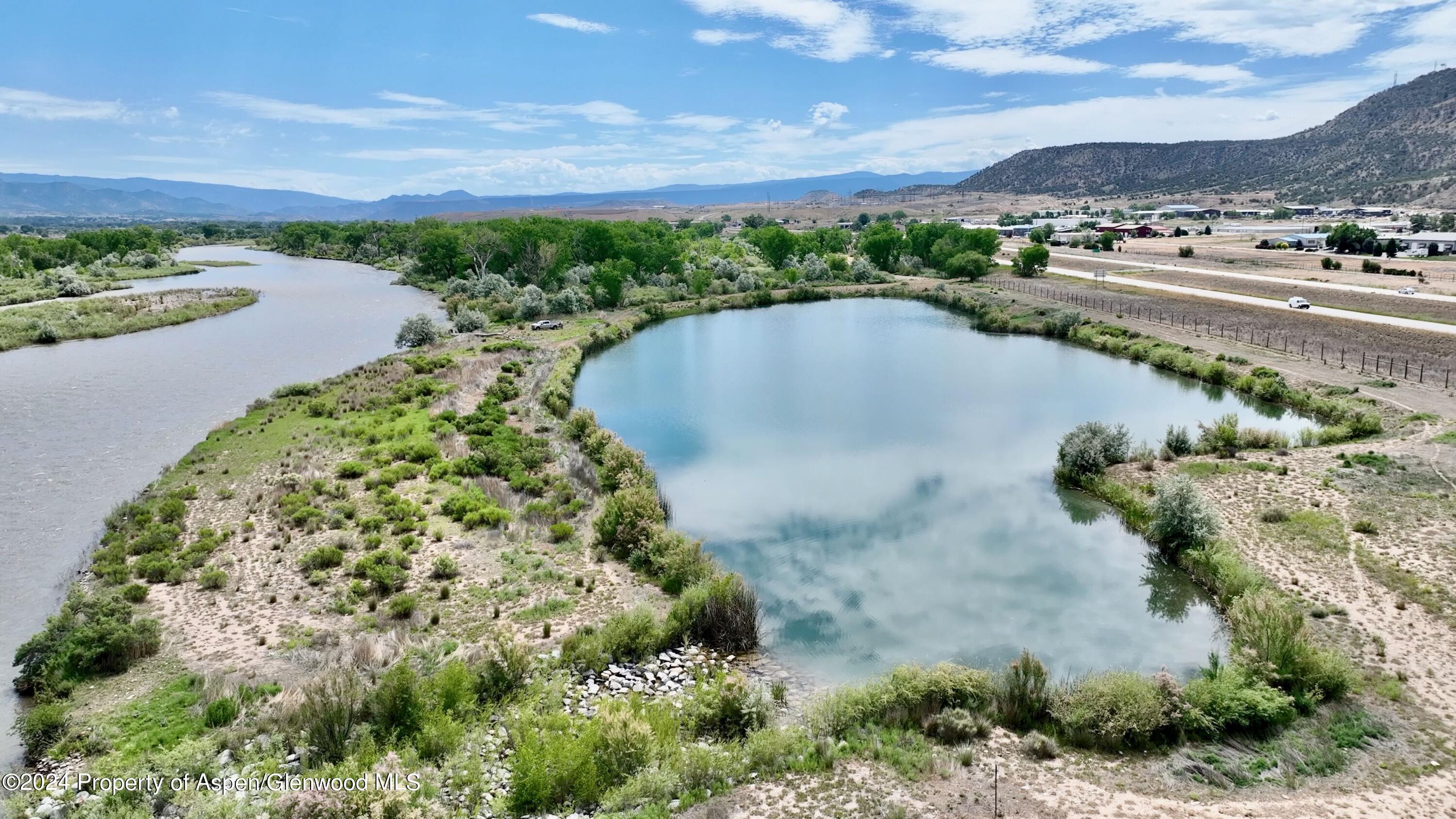 a view of a lake with a mountain in the background