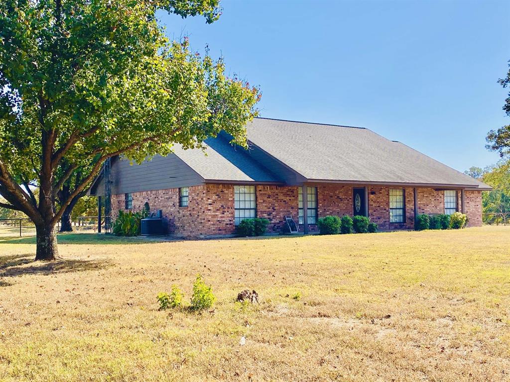 a front view of house with yard