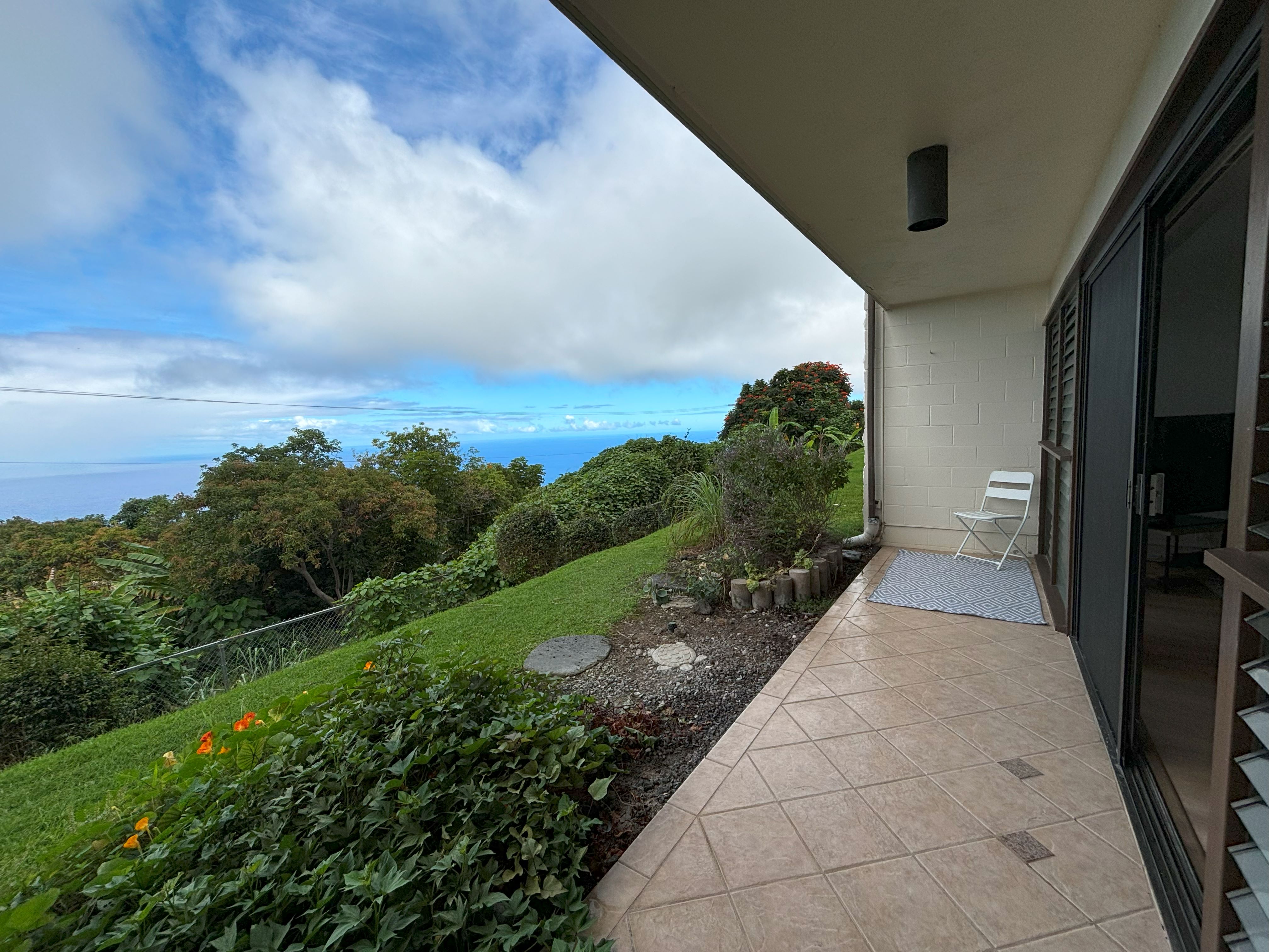 a view of a pathway both side of a house