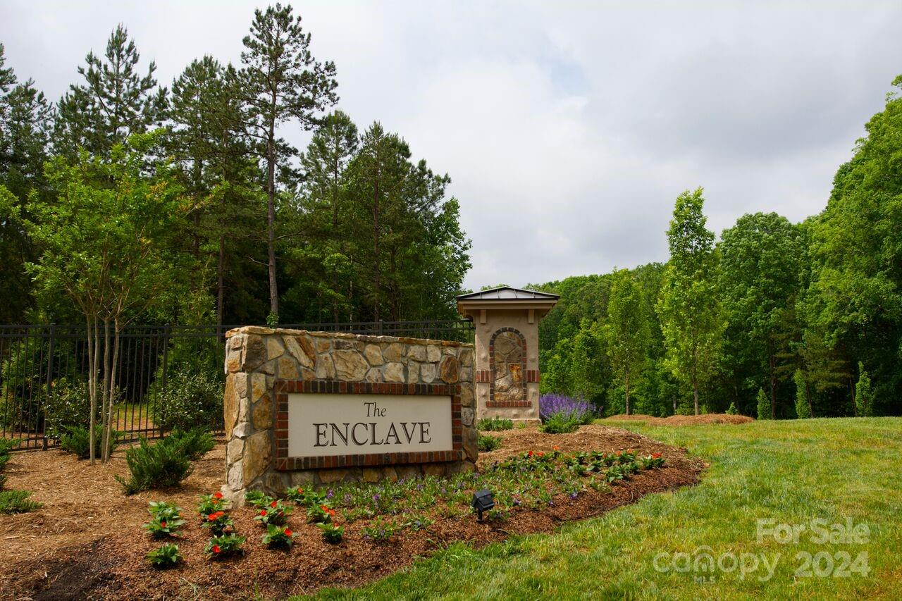 a view of sign board and yard