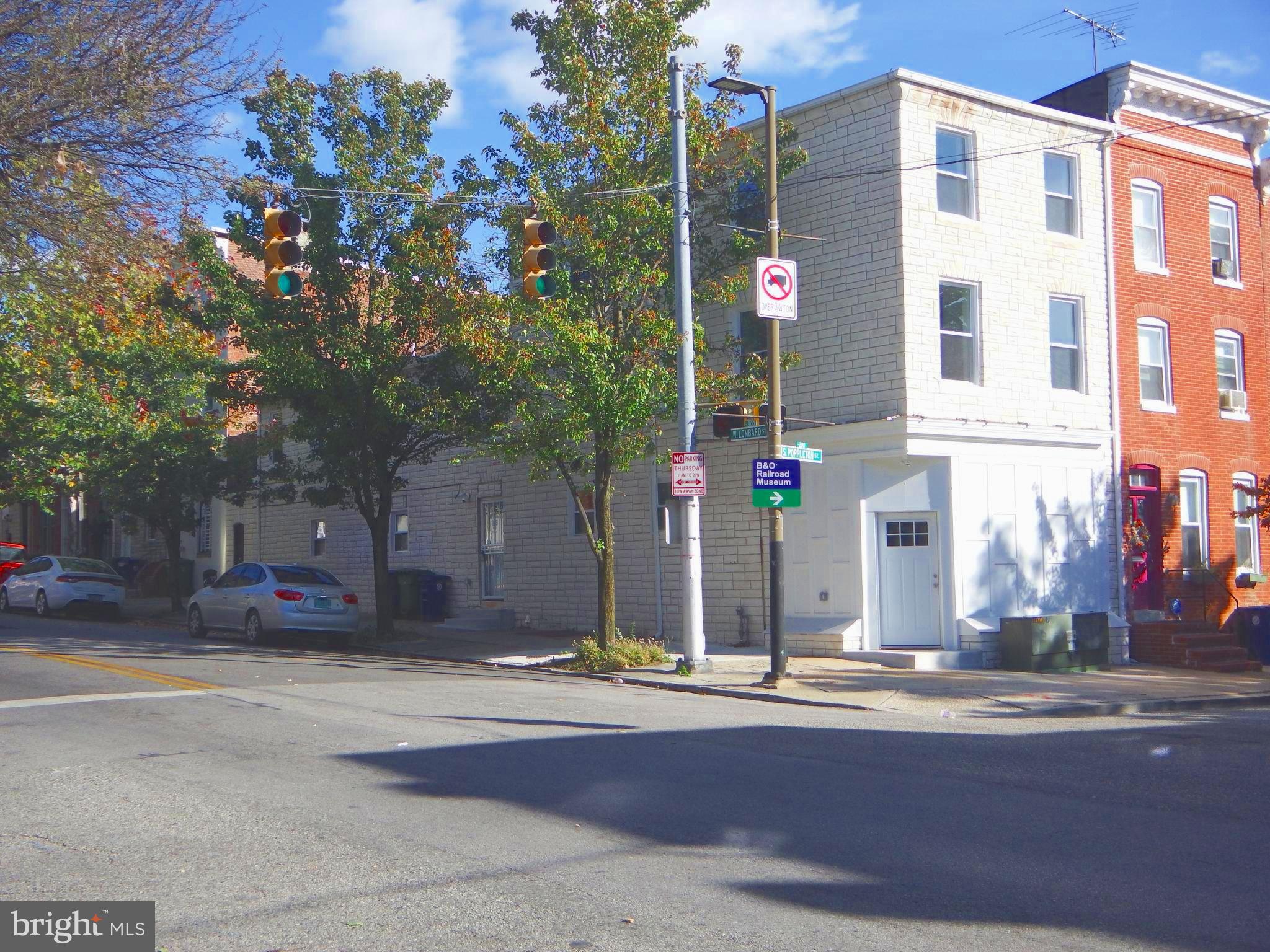 a front view of a building with street view