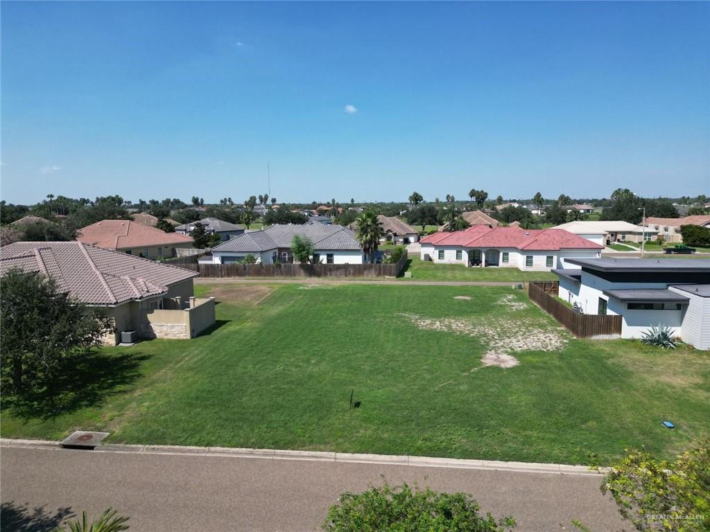 an aerial view of a house with a garden