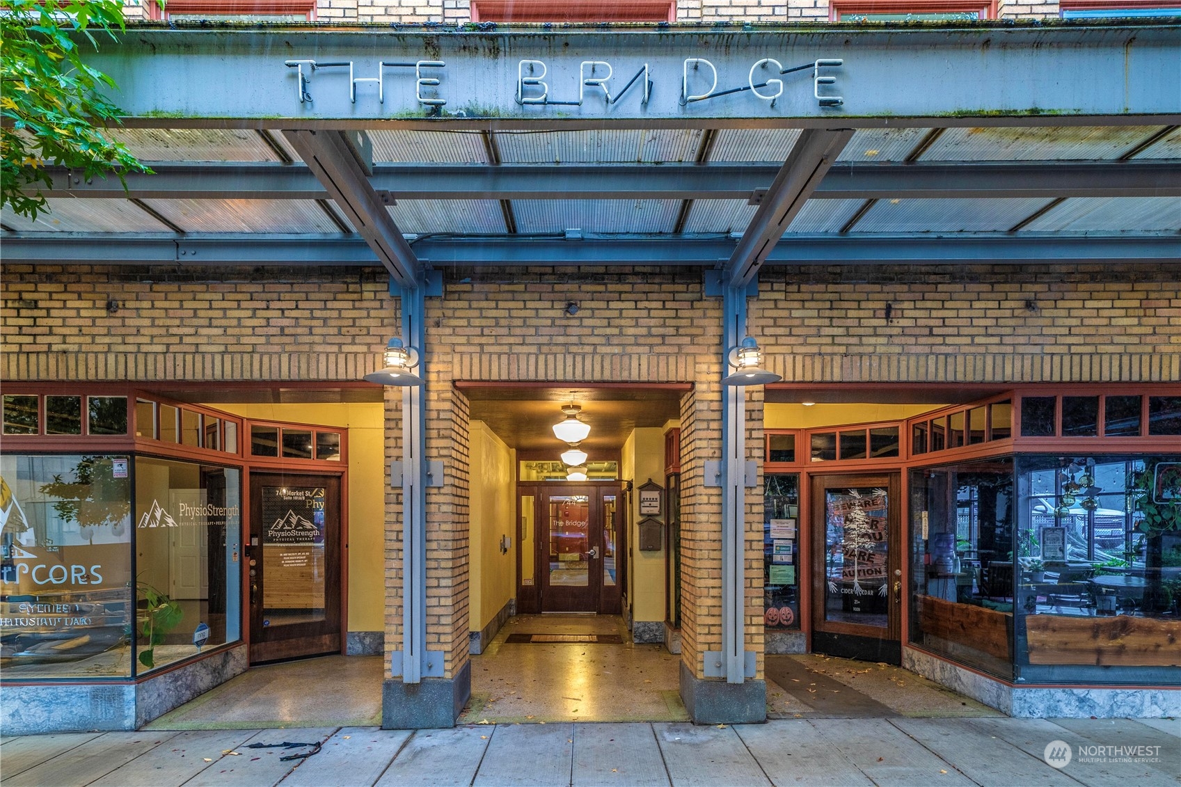 a view of a building with door space and balcony