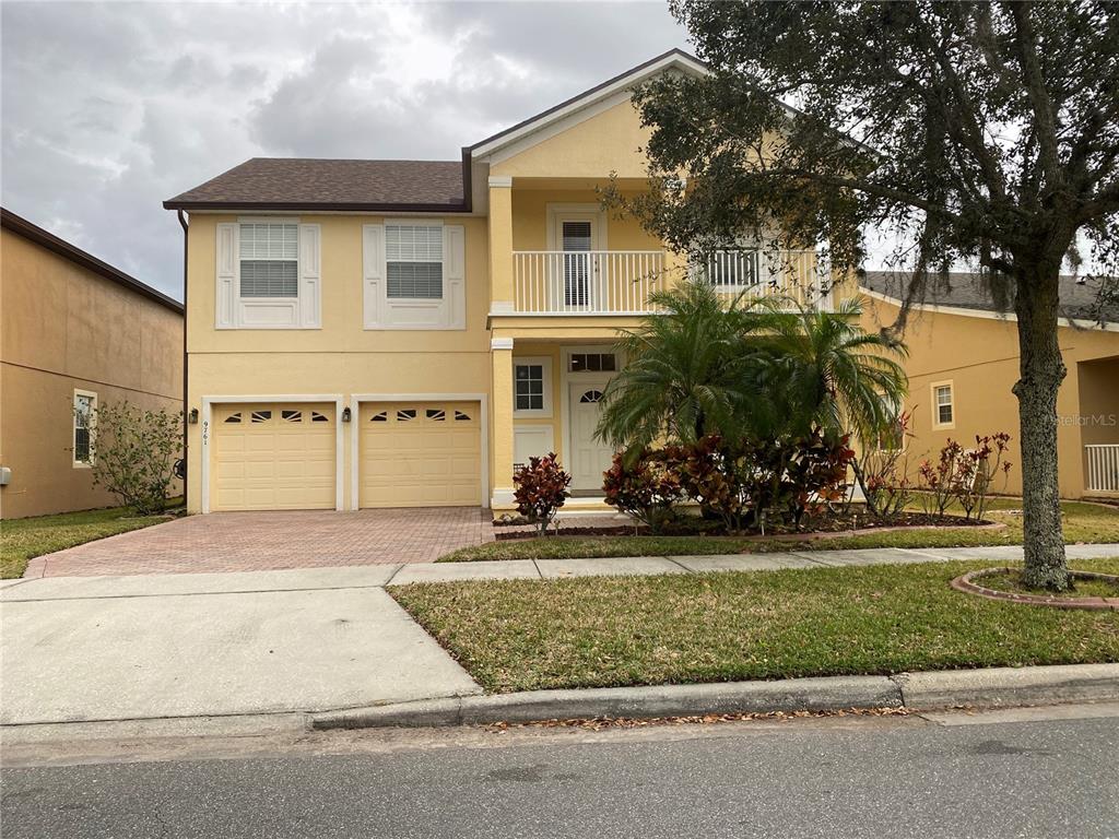 front view of a house with a yard