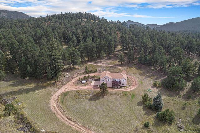 $3,000,000 | 4930 Parmalee Gulch Road | Indian Hills