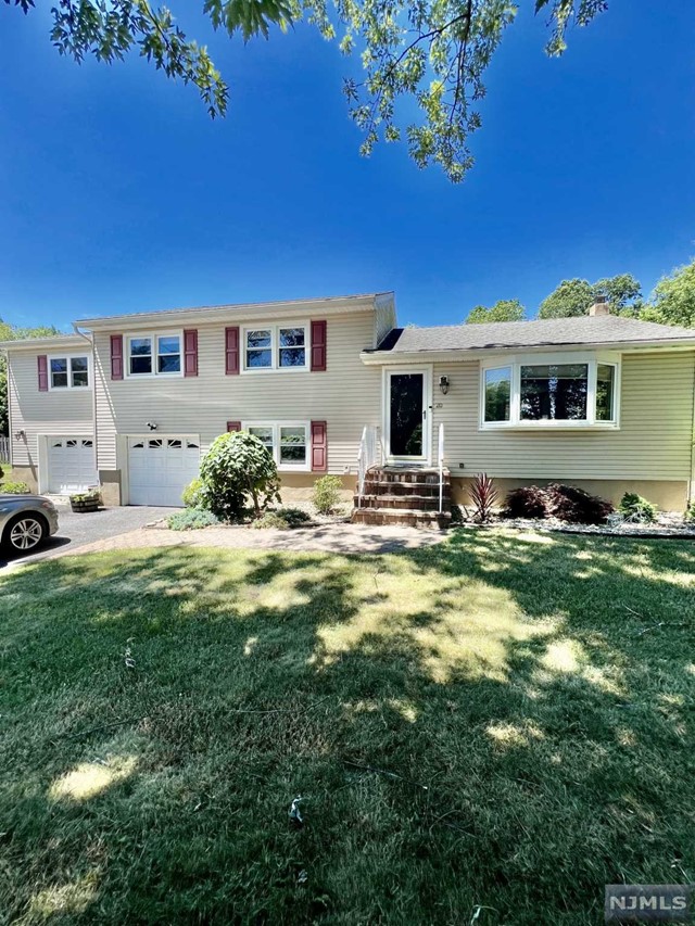 a house view with a garden space