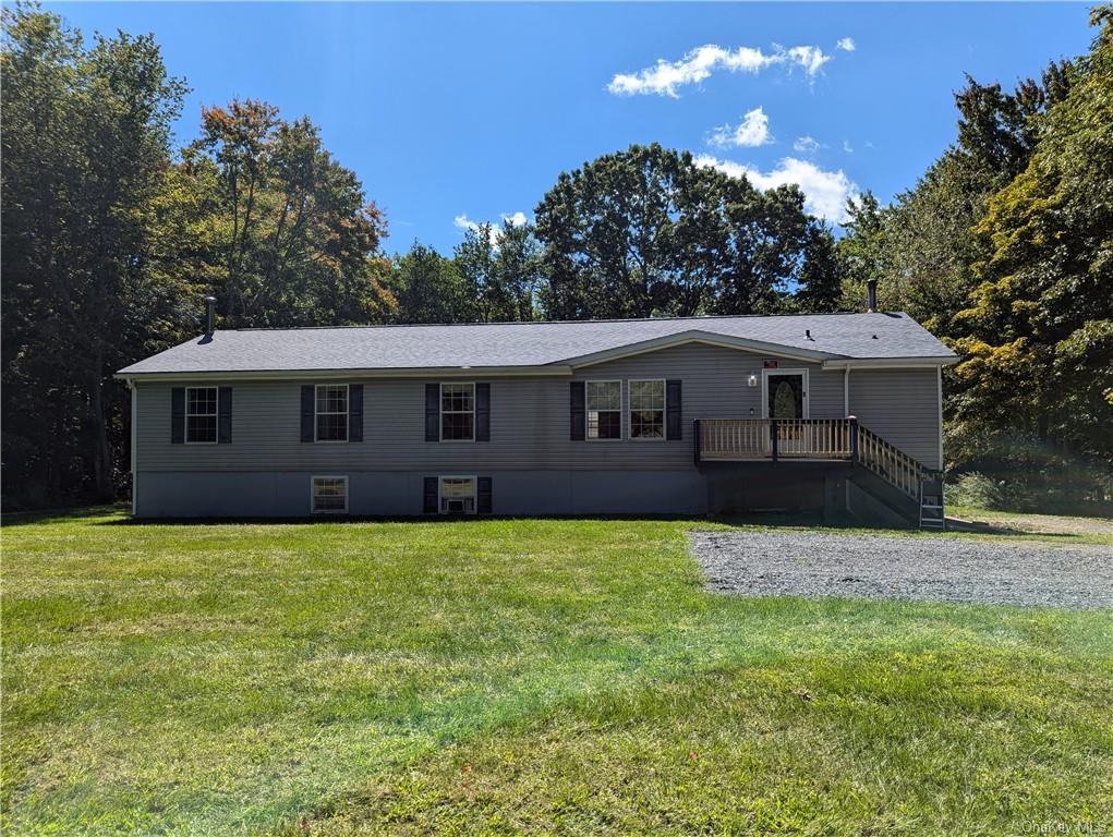 a front view of a house with yard