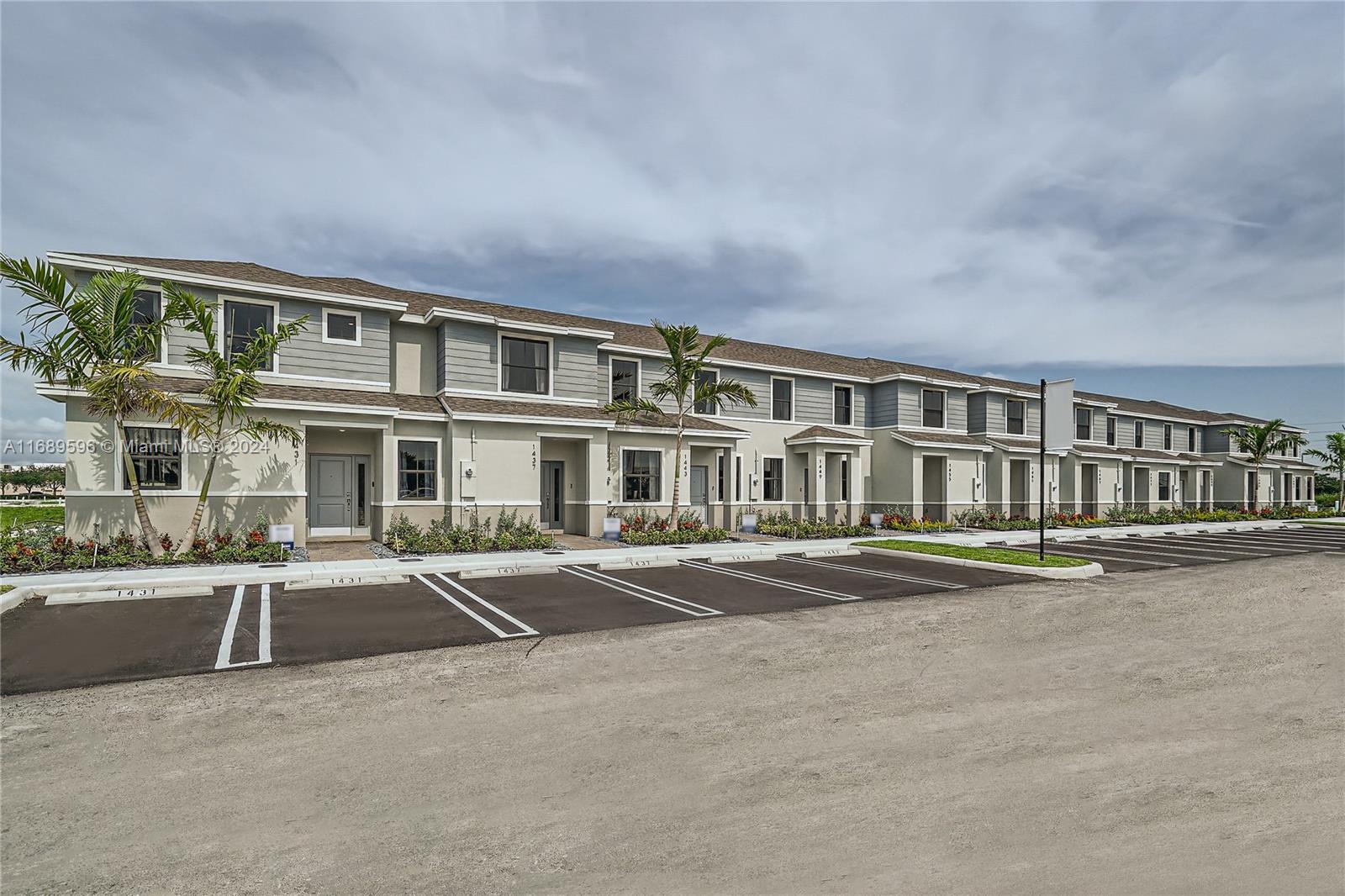 a front view of a building with street view