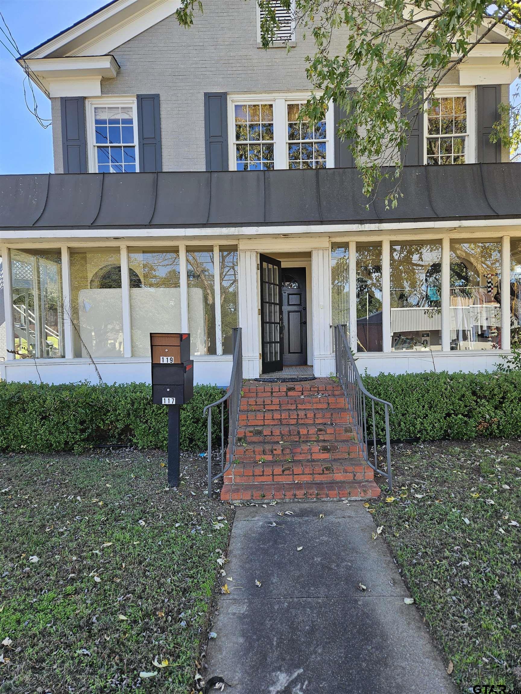 front view of house with a yard