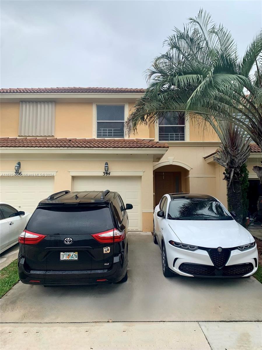 a car parked in front of a house