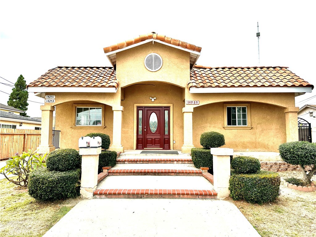 a front view of a house with a porch